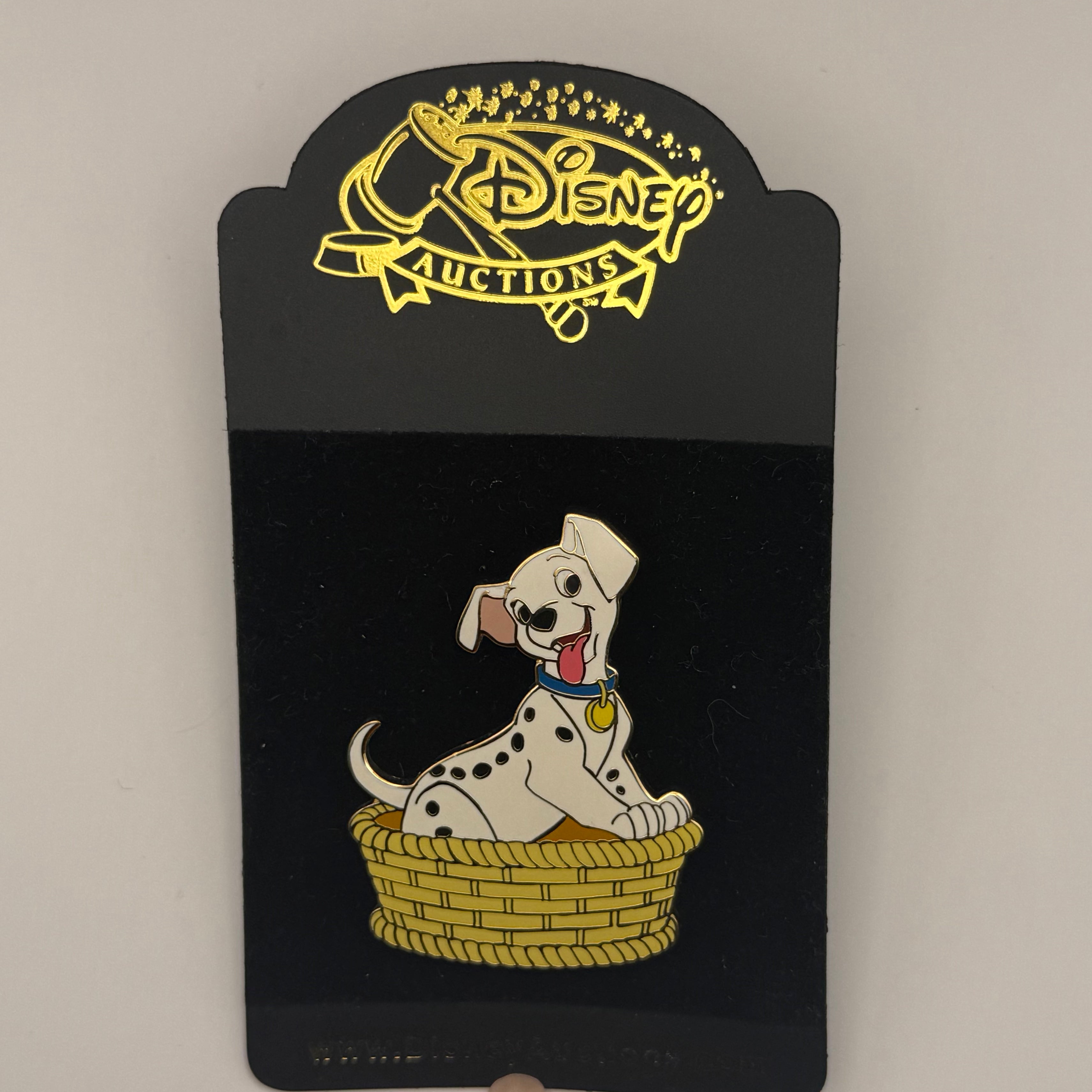 Lucky in a Basket (Error Pin)
101 Dalmatians
Disney Auctions Pin